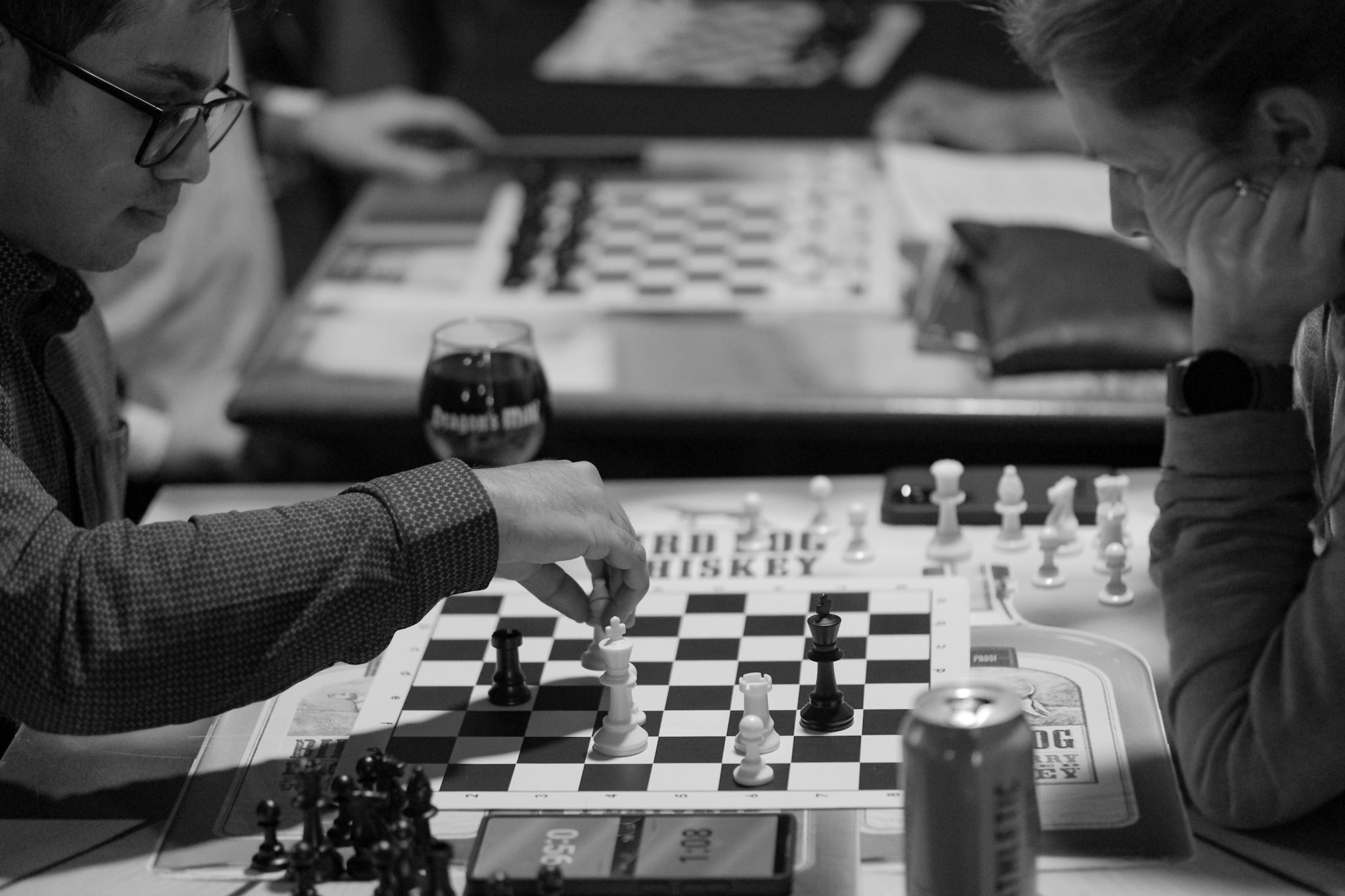 Two club members concentrating on a chess game